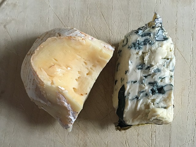 Two cheeses, one soft and one blue cheese