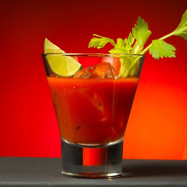 Bloody Mary cocktail with lime and celery