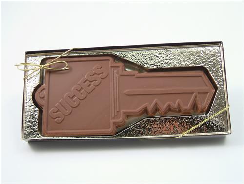 Choclate key with the words success written on it