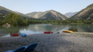 View of lake, boats and mountains