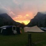 campsite in the mountains with sun setting