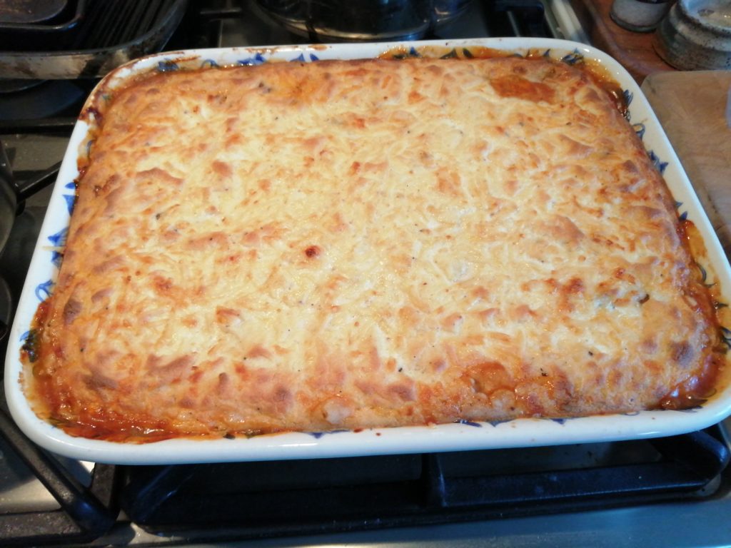 Large lentil cottage pie in ceramic oval dish