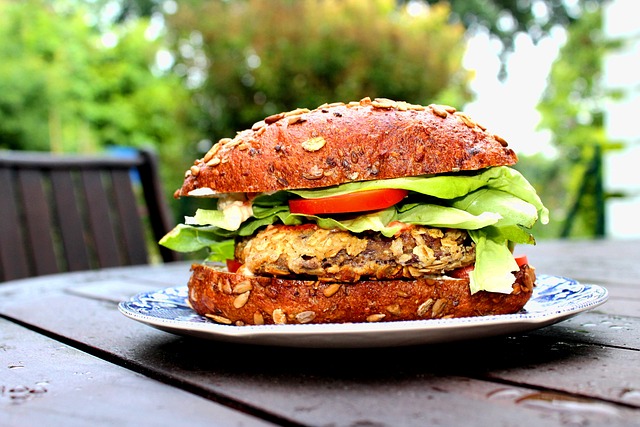 Bean burger in a seeded bun on a plate on the table